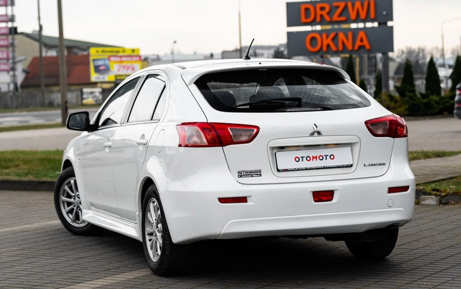 Mitsubishi Lancer cena 32900 przebieg: 150000, rok produkcji 2014 z Radom małe 596